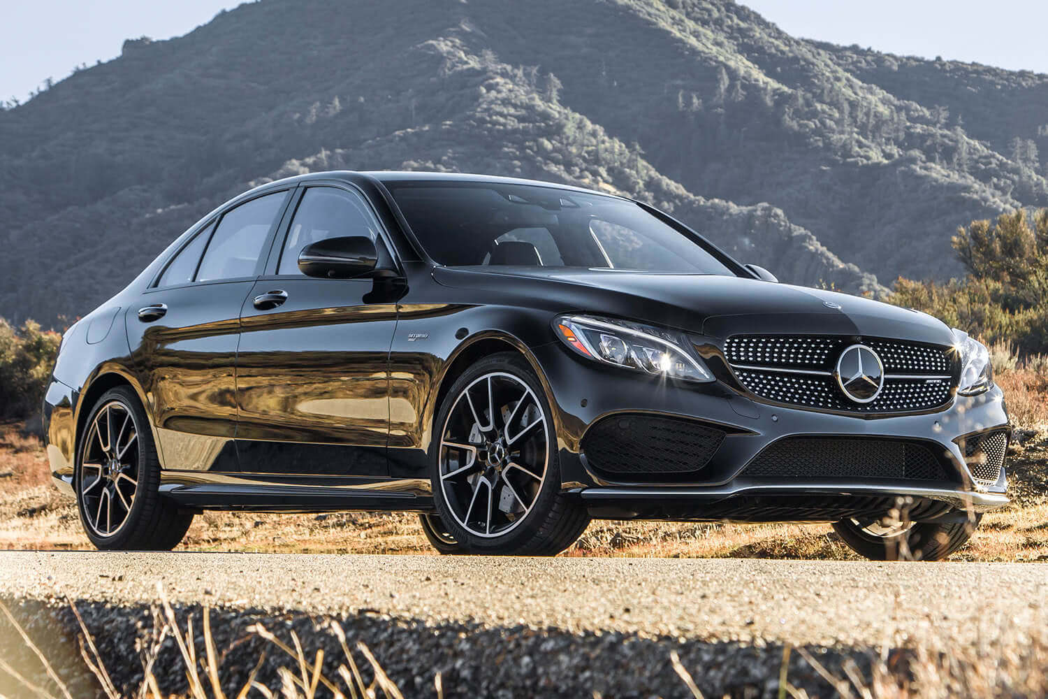 2017-Mercedes-Benz-C-Class-AMG-Sedan-Front-Quarter-1500x1000